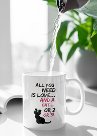 Load image into Gallery viewer, Cat Coffee Mug -Funny Cat Lovers Gift For Women Or Men - &quot;All You Need Is Love And A Cat Or 2 Or 3&quot;

